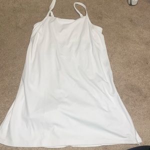 white tennis dress with shorts built in. size medium.